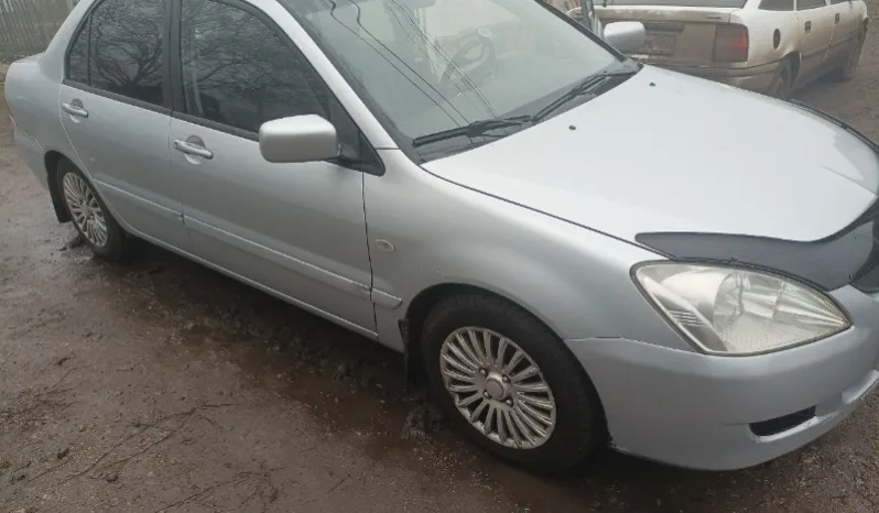 
								Mitsubishi Lancer полный									